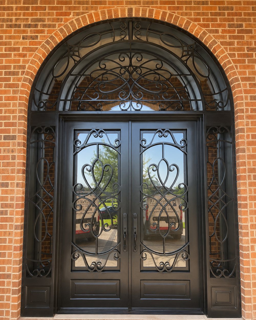 Double iron doors after — refinished